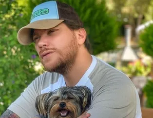 Sinan Akçıl köpeğiyle beraber...