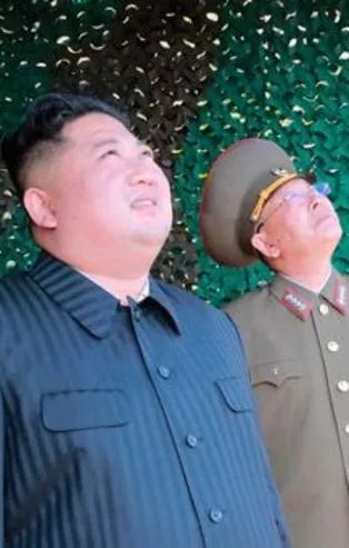 Kuzey Kore'nin füze ateşlemesini Kim Jong-un da izledi