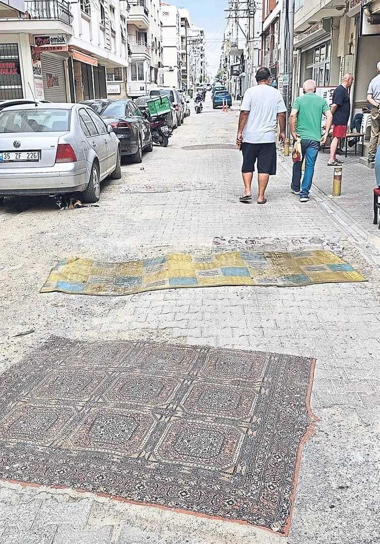 1781681551593.jpeg İZSU kazdı CHP'li belediye unuttu sokaklara halı serildi | İzmirlinin toz çilesi-3