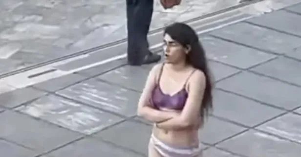 İran'da kadın öğrenciden çıplak protesto!