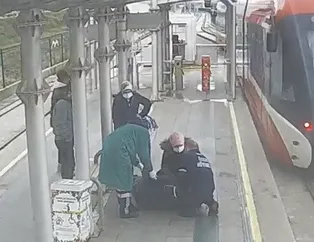 Durakta tramvay beklerken kalp krizi geçiren vatandaşı güvenlik görevlisi kalp masajı ile kurtardı