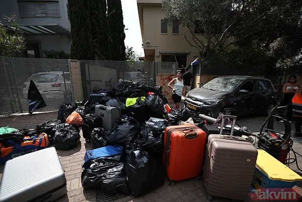 Siyonistler tası tarağı toplayıp kaçıyor! A Haber İsrail Tel Aviv'deki yıkımı görüntüledi... Binalar enkaza, araçlar hurda yığınına döndü - 21