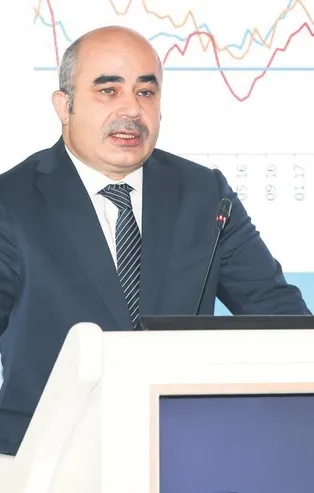 Merkez enflasyon tahminini düşürdü