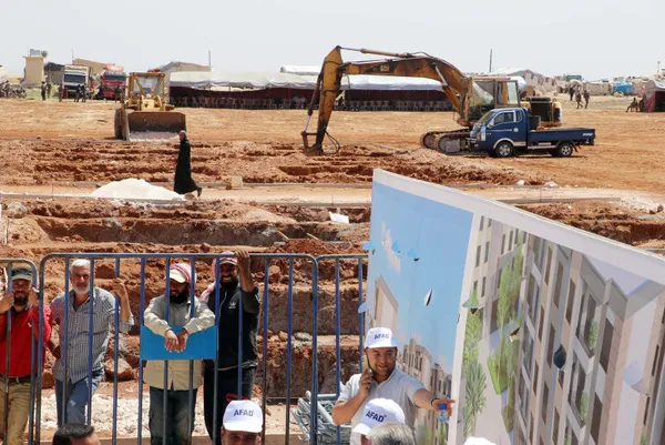 suriyelilerin-onurlu-donusu-icin-dev-adim-240-bin-aileye-yuva-olacak-konutlarin-temeli-atildi-1684988165629.jpg