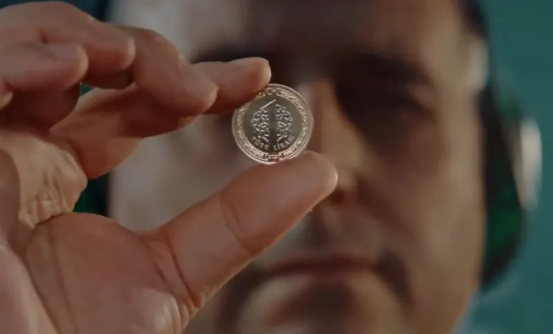 1-tllik-madeni-paranin-on-yuzune-bakin-tam-orta-kisimdaki-sembol-bakin-neymis-1723702938944.jpg