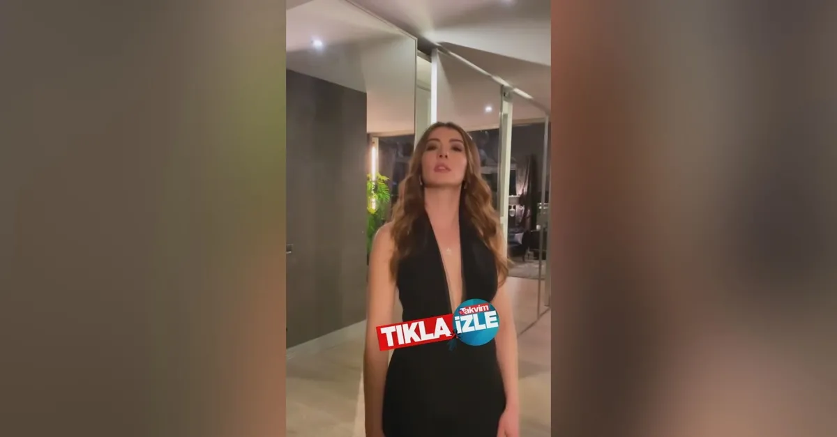 Burcu Özberk'in göğüs dekolteli kıyafetiyle salına salına yürüdüğü paylaşımı sosyal medyayı salladı