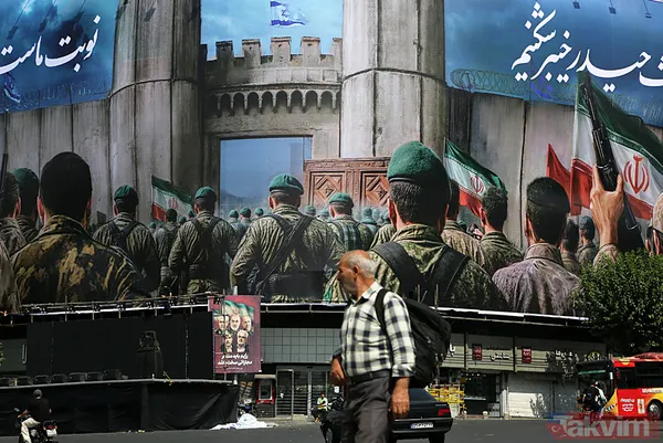 İran-İsrail arasın misilleme savaşı! Tahran sokaklarında “intikam” afişleri - 4