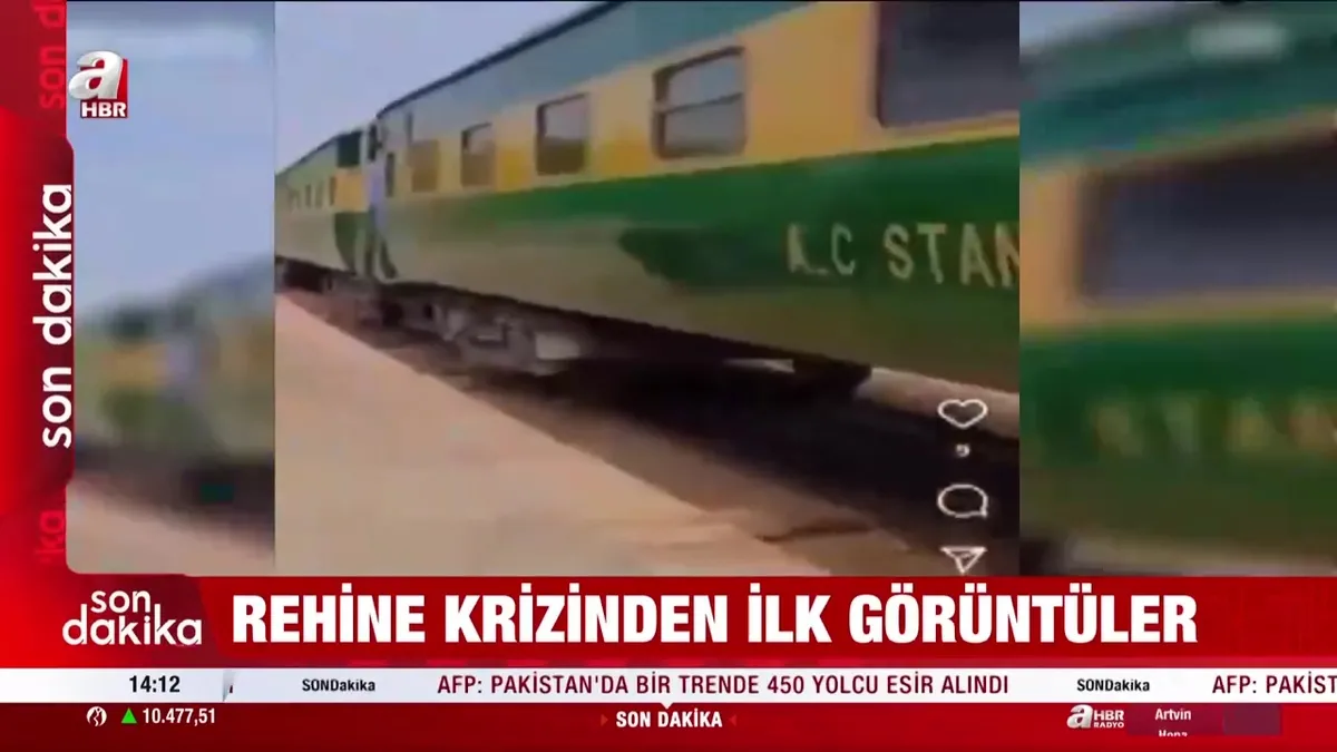 Pakistan'da 450 tren yolcusu rehin alındı