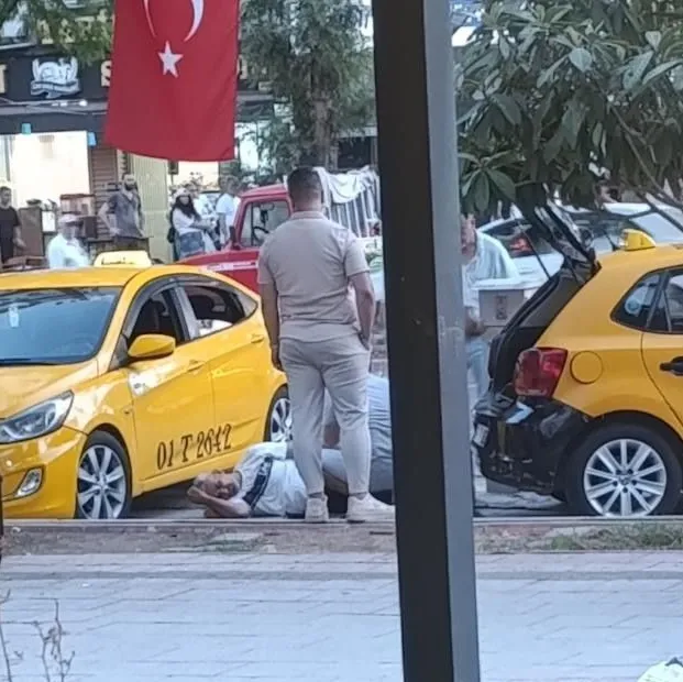 Tartıştığı taksicilerin ayaklarına sıktı