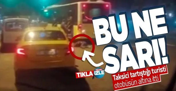 Faciaya ramak kala! Taksicinin tartışma sonrası ittiği kadın otobüsün altında kalmaktan son anda kurtuldu
