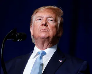 İrandan Trumpa: Takım elbiseli terörist!