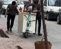 Elektrikli scooter ile çamaşır makinesi taşıdılar