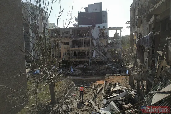 İran'dan İsrail'e misilleme! Füzeler yağdı binalar yıkıldı | İşte yıkımdan kareler - 18