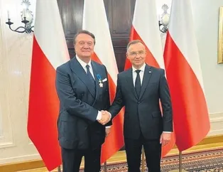 Başkan Hasan Arat’a üstün liyakat madalyası