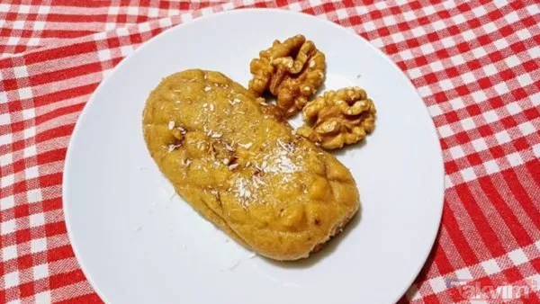 Kalburabastı: Hamurun içine ceviz konularak yapılan, üzeri kalbur veya rende ile şekillendirilen geleneksel bir şerbetli tatlıdır. (Takvim Foto Arşiv, Taste...