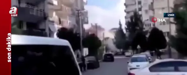 İzmirde meydana gelen depremde bir binanın yıkılma anı kameraya yansıdı