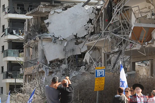 İran'dan İsrail'e misilleme! Füzeler yağdı binalar yıkıldı | İşte yıkımdan kareler - 16