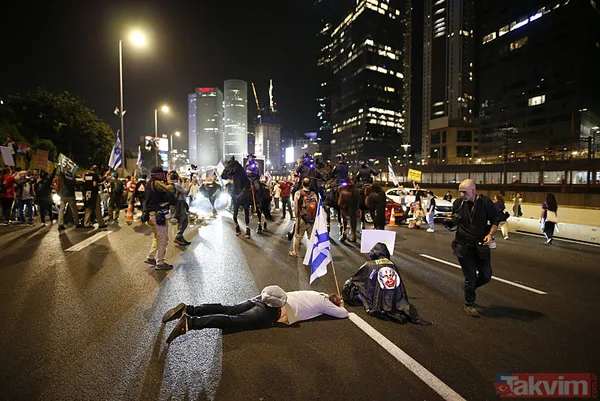 İsrail sokakları karıştı | Tel Aviv sokaklara döküldü! Katil Netanyahu'ya tepki yağdı: İstifa et - 22