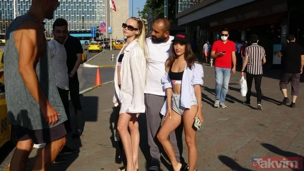 Yabancı uyruklu iki kadın Taksim Meydanı'nı podyum gibi kullanıp poz verdi - 2