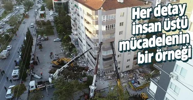 İzmir Bayraklı’da yan yatan bina 3  vinçle desteklenerek arama kurtarma çalışmaları yapılıyor
