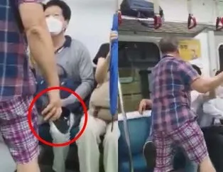 Metroda akılalmaz maske kavgası! Terliğini çıkarıp tek tek saldırdı