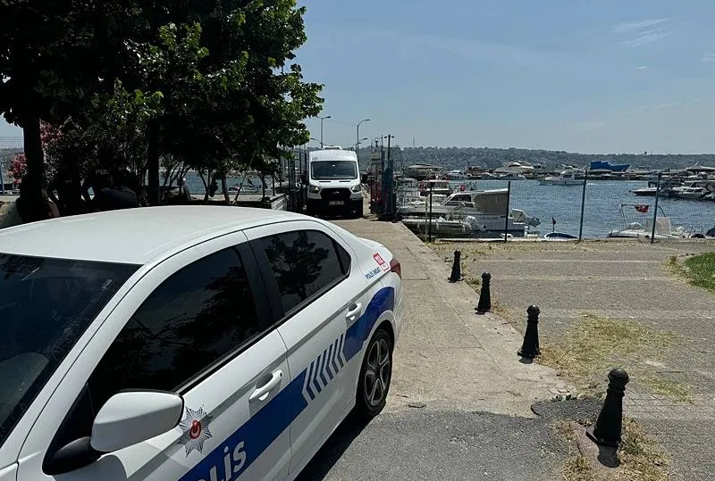 Ağırlık bağlanmış halıya sarılmış