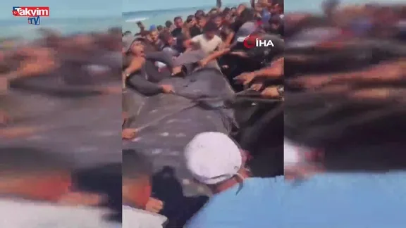 Gazze'de yaklaşık 10 metre uzunluğundaki dev balık karaya vurdu