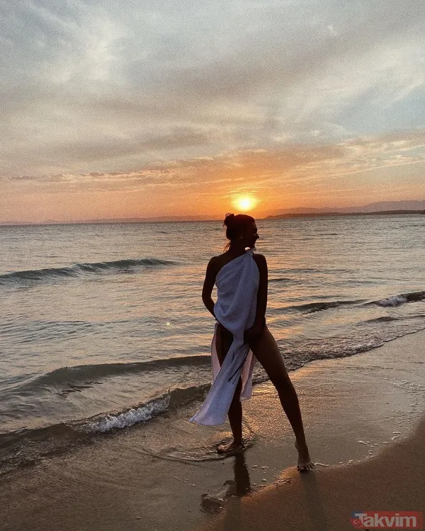 Melisa Döngel’den cüretkar paylaşımlar! Önce plajı podyuma çevirdi poz verdi sonra beyaz bikinisiyle dans etti sosyal medya sallandı - 6