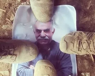 Teröristbaşının fotoğrafı ayaklar altında