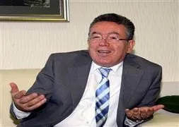 Özcan’dan başörtüsü cevabı