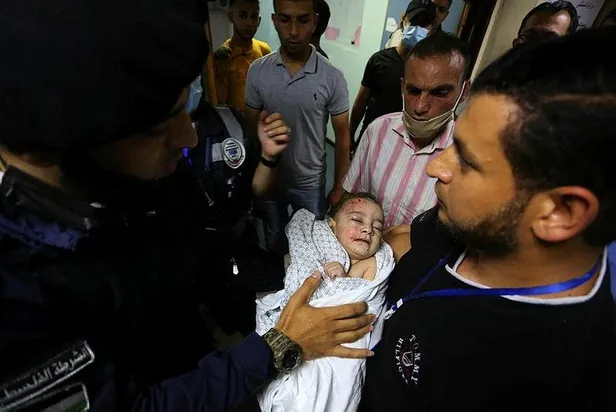 Gazzeli gencin en acı günü: Fotoğraflarını çektiği şehitlerin arasında iki kardeşinin bulunduğunu fark etti-5