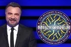 Metin Oktay 1969 yılında hangi futbolcuyla forma değiştirmiş ve 10 dakikalığına Fenerbahçe forması giymiştir?