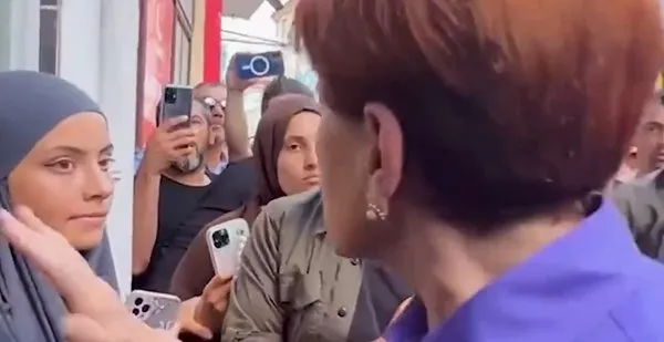 meral-aksener-kendisine-soru-soran-kizi-azarladi-parmak-salladi-1659711023459.jpeg