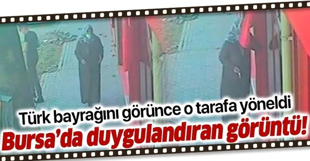 Bursa’da Türk bayrağını 3 kere öperek alnına koyan kadın görenleri duygulandırdı