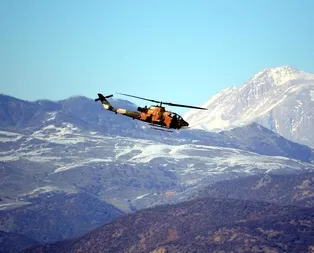 Helikopterler ateş altına aldı