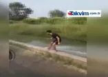 Sulama kanalında sörf yapan Adanalı