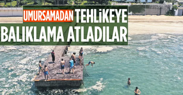 Türkiye, Marmara'yı saran müsilaja karşı düğmeye bastı! Vatandaşlar ise beyaz tehlikeye aldırmadı
