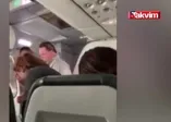 Uçak acil çıkış kapısında akılalmaz olay!