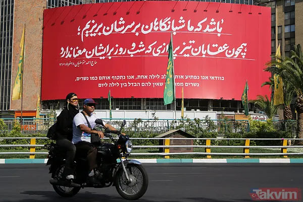 İran-İsrail arasın misilleme savaşı! Tahran sokaklarında “intikam” afişleri - 7