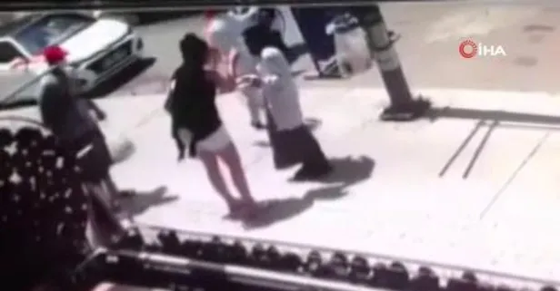 Başörtülü kadına şişeli saldırı!