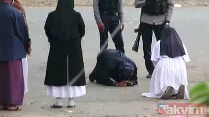 SON DAKİKA: Tarihe geçecek fotoğraf! Rahibe polislerin önüne kapanıp yalvardı