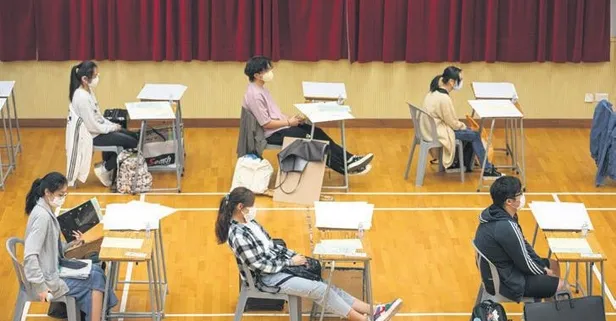 Hong Kong'da Coronavirüs salgınına rağmen sınav yapıldı