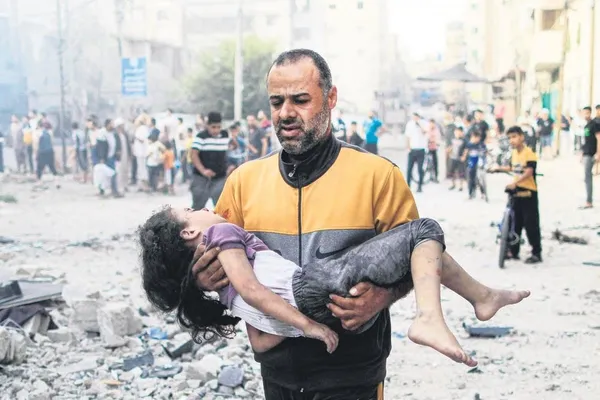 israel-1697328987514.jpeg İsrail'den katliam! Bombalar altında yüzlerce çocuk öldü: Ellerine "cesetleri tanınsın" diye ad-soyadları yazıldı-6