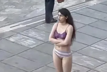 İran'da kadın öğrenciden çıplak protesto!