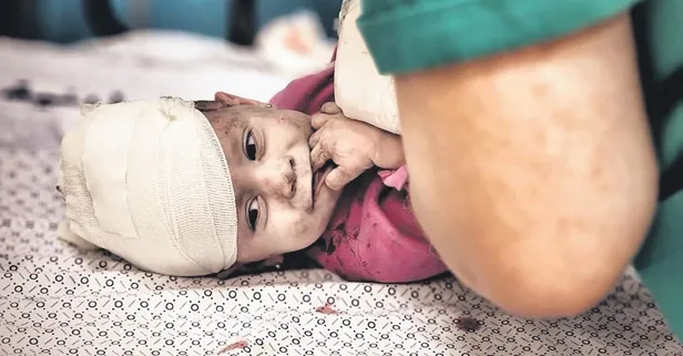 İsrail'den katliam! Bombalar altında yüzlerce çocuk öldü: Ellerine "cesetleri tanınsın" diye ad-soyadları yazıldı