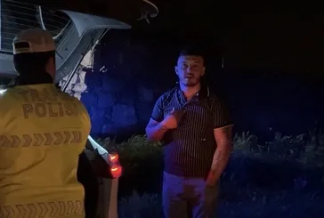 Yangını izlemeye geldi, cezayla döndü