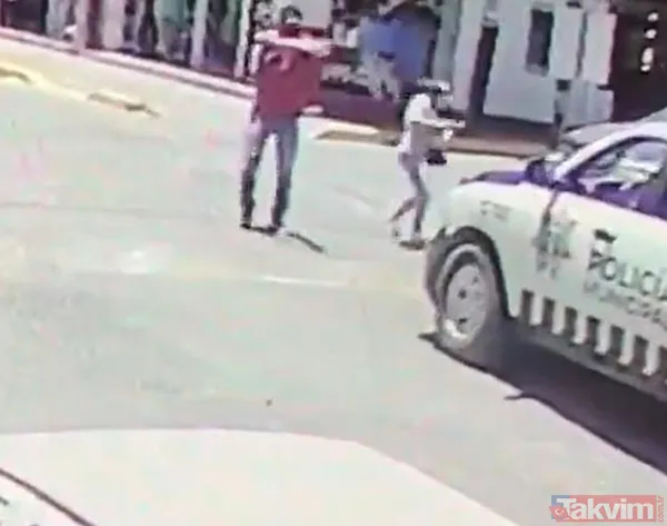 Ancak İkili Caddenin Ortasına Ulaştığında Birden Çantalarından Silahlarını Çıkarıyor, Kırmızı Işıkta Bekleyen Polis Aracına Güpegündüz Arka Arkaya Ateş Açmaya...