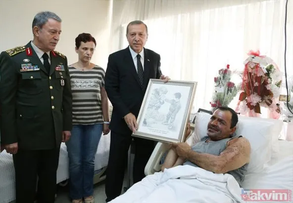 Binbaşının nefesiyle çocuğun elini ısıttığı fotoğraf Başkan Erdoğan’ın çalışma odasının baş köşesinde