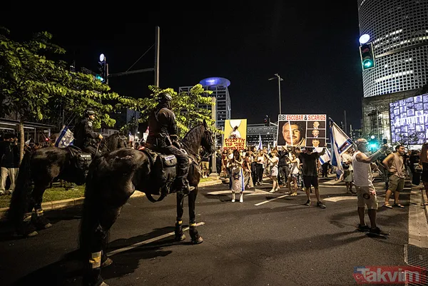 Tel Aviv yine sokaklara döküldü! Eli kanlı Netanyahu'nun evinin önünde büyük protesto: Sen baştasın, sen suçlusun - 15