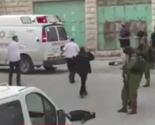 Katil devlerin askerleri yaralı Filistinliyi katletti